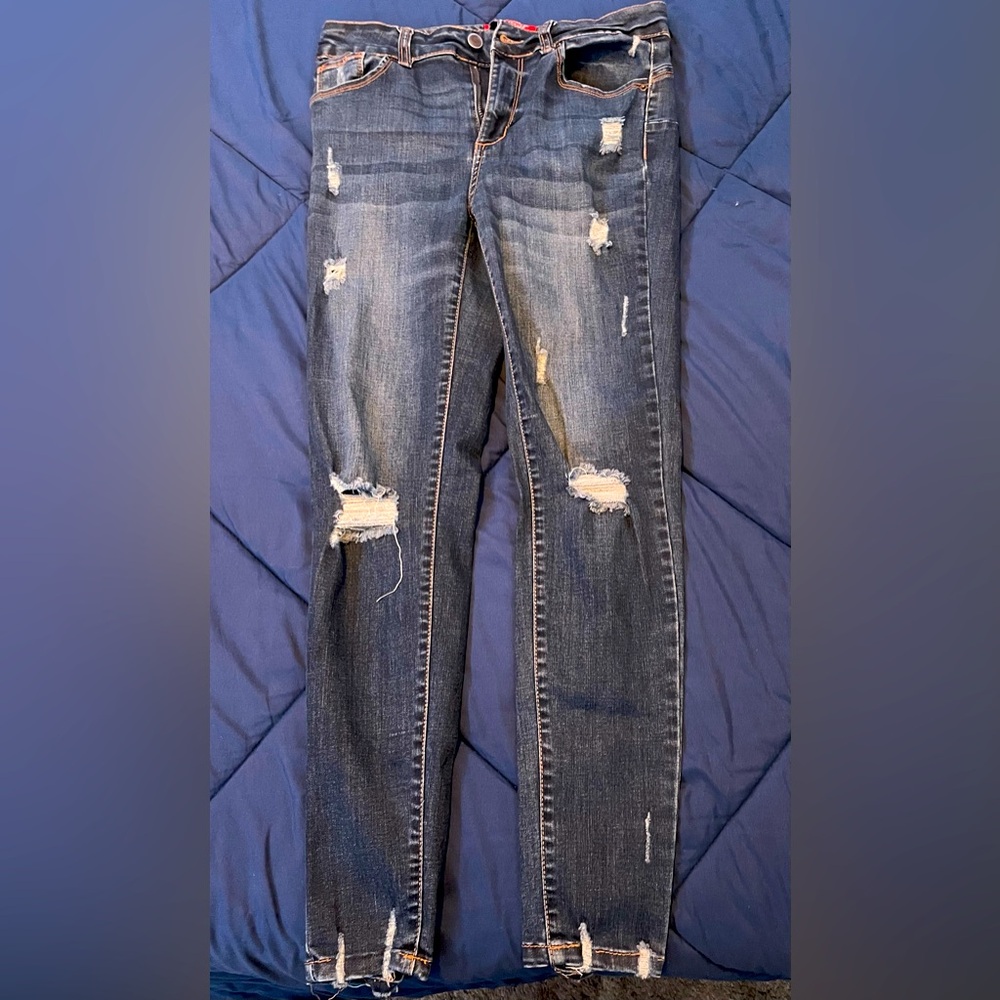 Distressed Blue Jeans